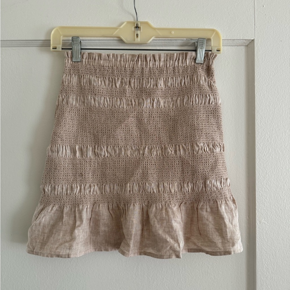 Tan linen skirt! So fun and cute. Never worn, too small for me!